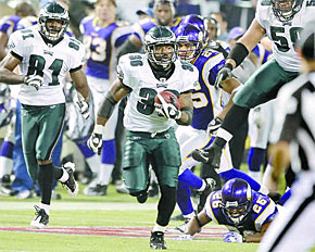Brian Westbrook breaks free, taking a short pass from Donovan McNabb and turning it into a 71-yard TD in the Eagles' playoff win over the Vikings. (Ron Cortes / Staff Photographer)