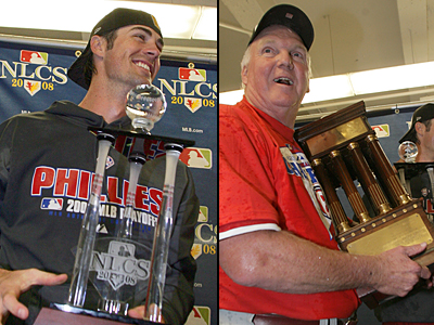 Cole Hamels holds the MVP trophy (left). Charlie Manuel holds the National League trophy.  ( Yong Kim / Staff Photographer ) 