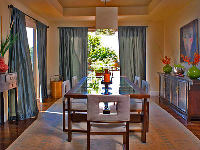 Put your best floor forward: An upgrade to hardwood floors from carpet is a bonus for both the eyes and the feet. The furniture and windows also make the room appear larger and longer.