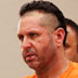 Craig Arno, 44, of Atlantic City, who is charged with kidnapping and carjacking in the May 21, 2010 abduction of a man from North Bergen, from a casino garage, appears in the Atlantic County Courthouse, in Mays Landing, N.J.,  with her attorney Steven Scheffler on Wednesday, June 2, 2010. (AP Photo/The Press of Atlantic City, Bill Gross)