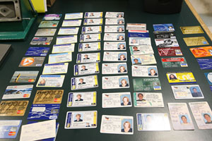 photo of some of the fake ids found at their place, from Philly.com