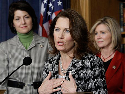 Rep. Michele Bachmann, R-Minn., center, flanked by Rep. Cathy McMorris Rodgers, R-Wash., left, and Rep. Marsha Blackburn, R-Tenn., gestures during a news conference on Capitol Hill in Washington, Wednesday, Nov. 18, 2009, to discuss the new mammogram guidelines. (AP Photo/Alex Brandon)