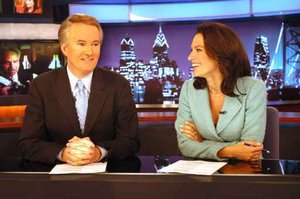 MGLANE20P3FEA 1/14/04 PHOTO BY APRIL SAUL News co-anchors Larry Mendte and Alycia Lane during a newscast. 