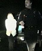 Images from a camera in New Britain Township Police Officer Darryl Allen&acute;s patrol car show him after he pulled over a driver on New Year&acute;s Day 2005 because he saw her vehicle weaving. A breath test showed her to be legally drunk. He told her to drive to the district police headquarters, where he assaulted her. He pleaded guilty to assaulting this woman.<br />
