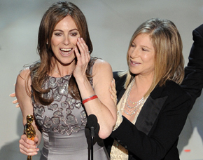 Kathryn Bigelow accepts the Oscar for best director — the first woman to win the category — from presenter Barbra Streisand. Bigelow’s film, “The Hurt Locker,” also won five other prizes. (Mark J. Terrill / Associated Press)