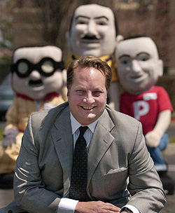 Jeffrey C. Rachor with the Pep Boys icons when he joined the Philadelphia firm.<br />