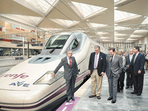 International officials are pictured in front of the high-speed train (AVE), linking Zaragoza to Madrid on May 29, 2009. (PEDRO ARMESTRE/AFP/Getty Images) 