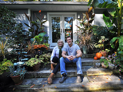 Eric and Carol Leeson sit on the front stoop of their West Chester home. ( Sharon Gekoski-Kimmel / Staff Photographer )