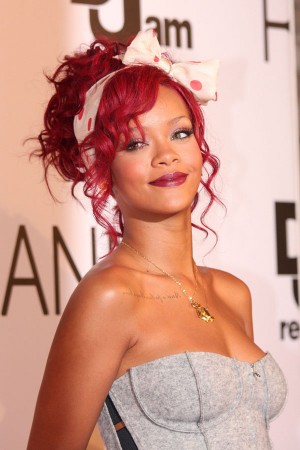 while Rihanna added tons of curly volume to her firey red hair for a