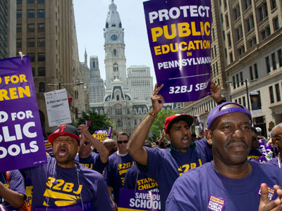 Members of the service Employees International Union Local 32BJ joined other blue collar union members of the School District of Philadelphia in a noon protest march up N. Broad St. to the School Administration Building Wednesday, May 23, 2012. (Clem Murray / Staff Photographer) 