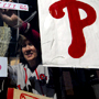 Ruth Paul hangs a sign in the front window of John C. Paul & Sons at 5th and Bainbridge streets in Philadelphia.<br /><br />David Maialetti /  Philadelphia Daily News