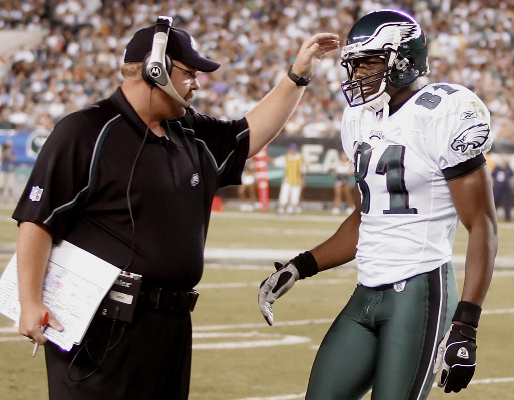 FILE - In this Jan. 23, 2005, file photo, Philadelphia Eagles wide receiver Terrell  Owens hugs Eagles free safety Brian Dawkins after the Eagles 27-10 victory  over the Atlanta Falcons in the