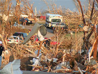 Residents survey the damage from a tornado that ripped  through the city of Picher, Okla.<br />