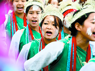 On festival day, women from the Tagin tribe in India&acute;s Arunachal Pradesh parade in costume and adornments.