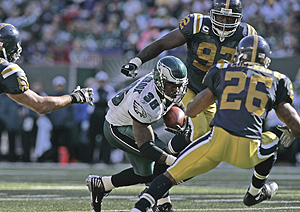 Eagles Brian Westbrook picks up 12 yards on a third-quarter carry.<br />
