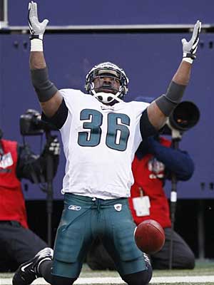 Philadelphia Eagles Brian Westbrook jumps over the pile and into the  endzone for a 1 yard touchdown late in the 2nd quarter at Giants Stadium in  East Rutherford, New Jersey on December