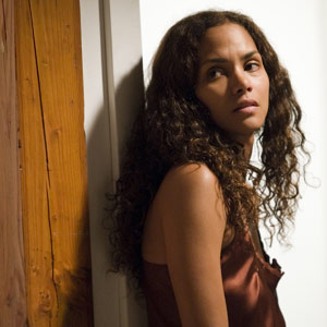 Berry portrays a grieving widow.