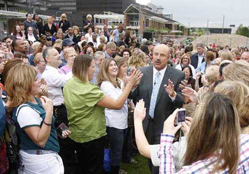 Dr. Phil in Center City with fans 