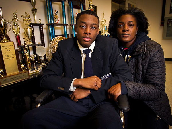 Darrin Manning, a student at Math Civics Science Charter school, was allegedly hurt during an arrest by Philadelphia police. Photograph with his mother Ikea Coney at the school. ( ALEJANDRO A. ALVAREZ / STAFF PHOTOGRAPHER )